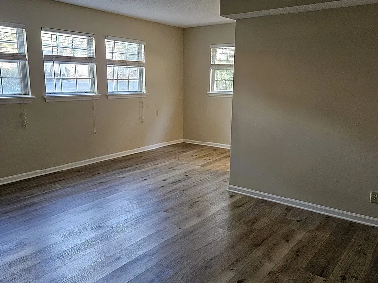 Living/dining area. Ground floor apartments have snap flooring.