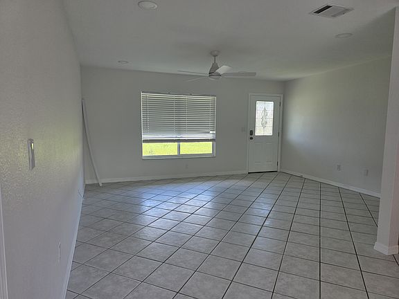 large open living room and front window