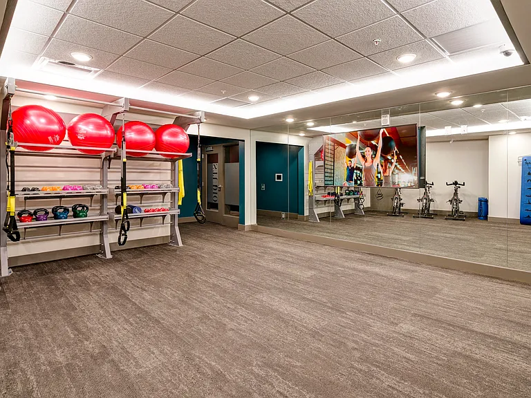 24/7 fitness center and yoga room