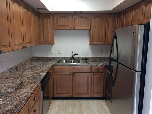 Upstairs kitchen- including all stainless steel appliances, microwave, and a dishwasher.