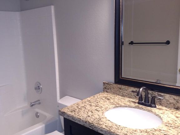 Downstairs full bath w/ upgraded vanity, shower, and tub
