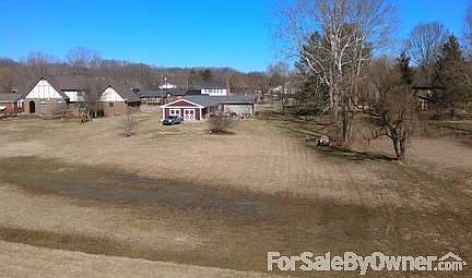 Back Yard!!
						:
						John Deere riding mower included! Piture taken in early spring. All Green Now!