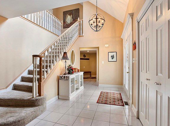Grand Foyer, 17 x 14 open and airy, drenched in natural sunlight. leads to Beautiful 1st floor Maste
