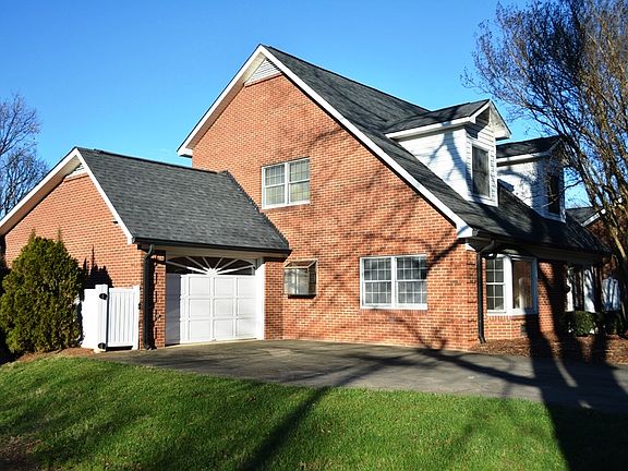 All brick w/ 1-car garage