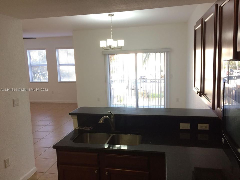 1st image of 11401 NW 89th St APT 215