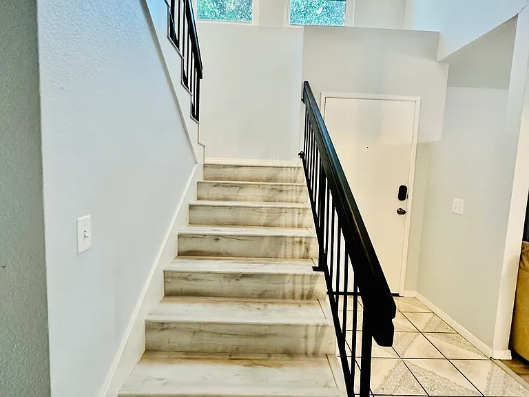 stairs to the second floor, all bedrooms are upstairs