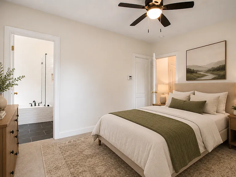 Main bedroom on back side of the house. Photos are virtually staged.
