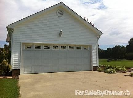 2 Car Garage
						:
						Door Remote Controlled