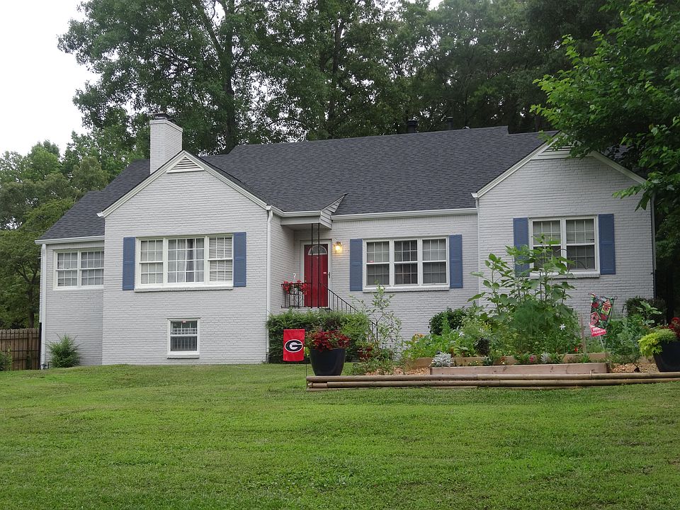 Front of home, apartment is the second floor entrance from t