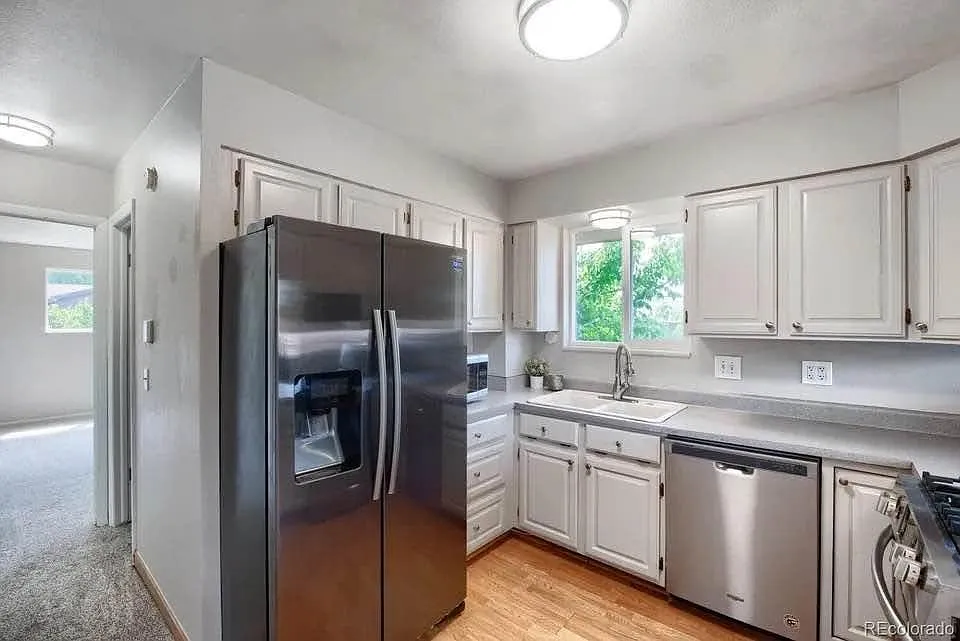 7056 W Rowland Ave — Photo 2