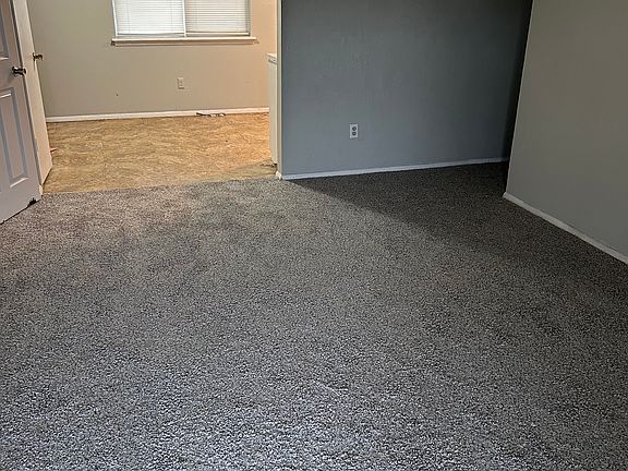 Living Rooming looking from front door toward Kitchen/Dining Area.
