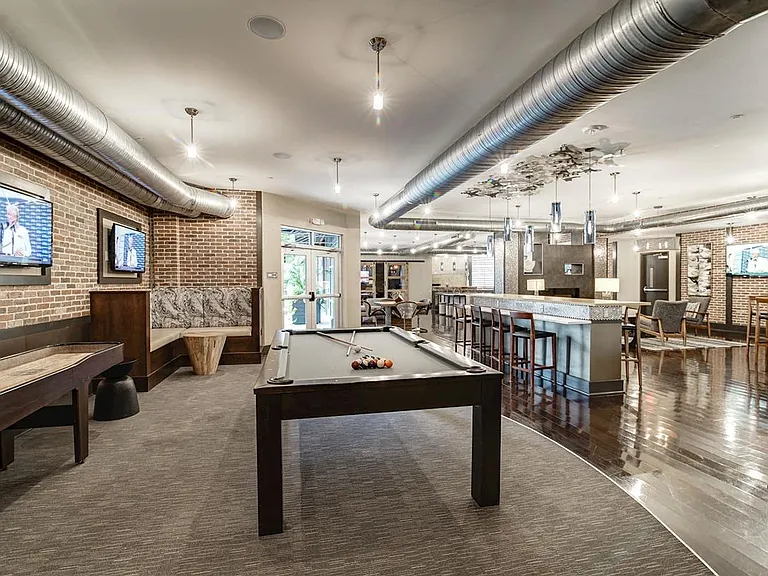 Host friends or unwind after work in our media-rich game room and entertainment center.