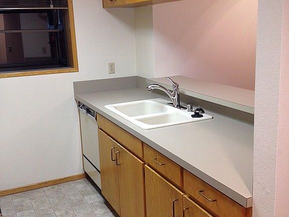 Dishwasher & Garbage Disposal. Lots of kitchen storage, Gard