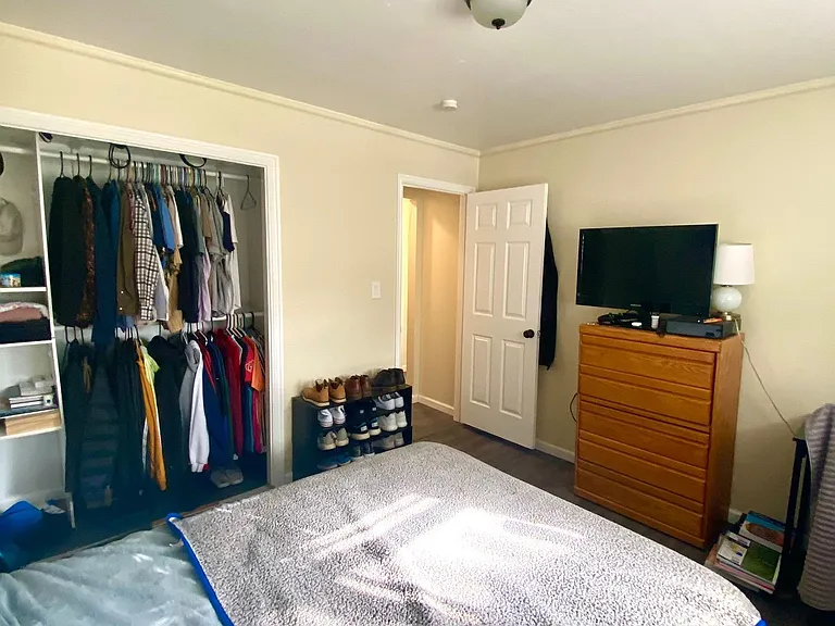 Spacious bedroom with large closet and fresh paint _ comfortable and move-in ready.