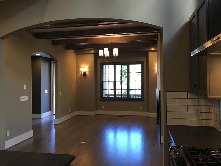 Open concept living room is adjacent to the kitchen.