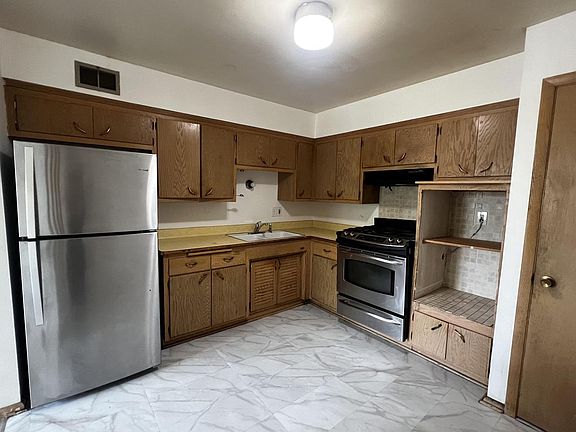5th image of 8708 W Villard AVENUE