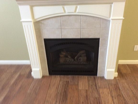 Self starting gas fireplace