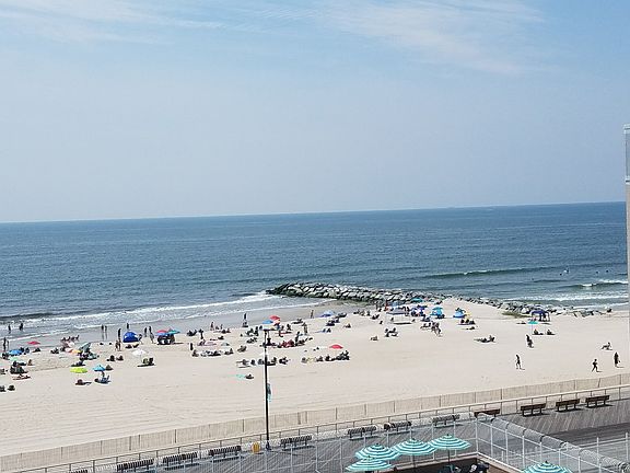 View of pool/beach from apt