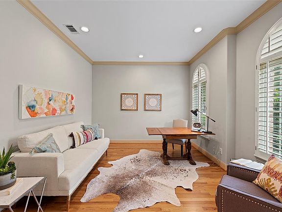 Right to the entrance is the living room, the perfect space for an office or sitting area.