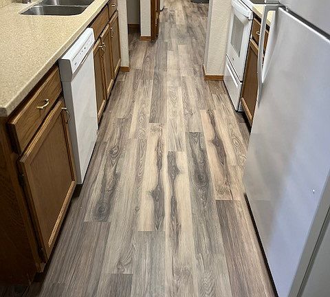 Updated Kitchen with hard surface countertops