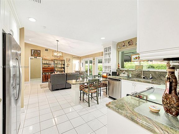 Open concept. Kitchen opens to large family room.