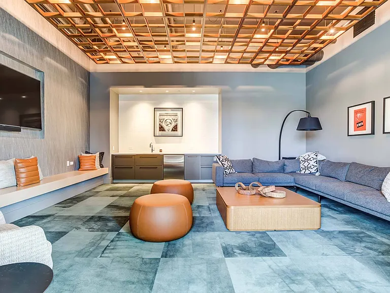 Escape to a cozy nook in the lounge area, offering a perfect spot to relax, read, or enjoy a peaceful moment in a snug, inviting corner.
