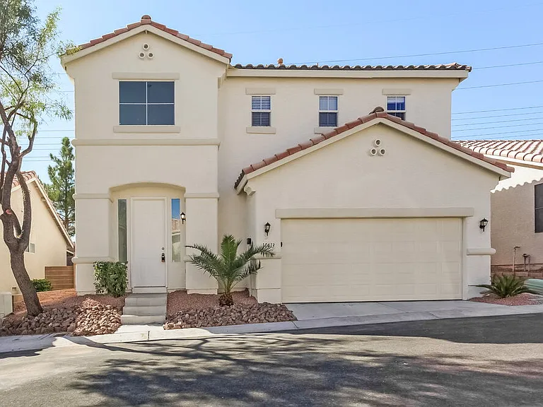 10413 Sloping Hill Ave — Photo 1