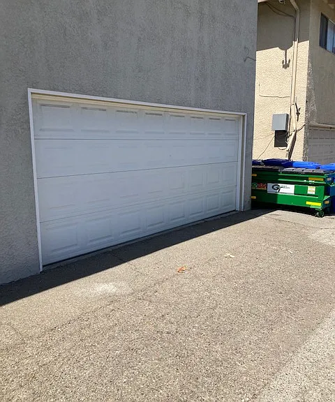 One reserved space in shared garage