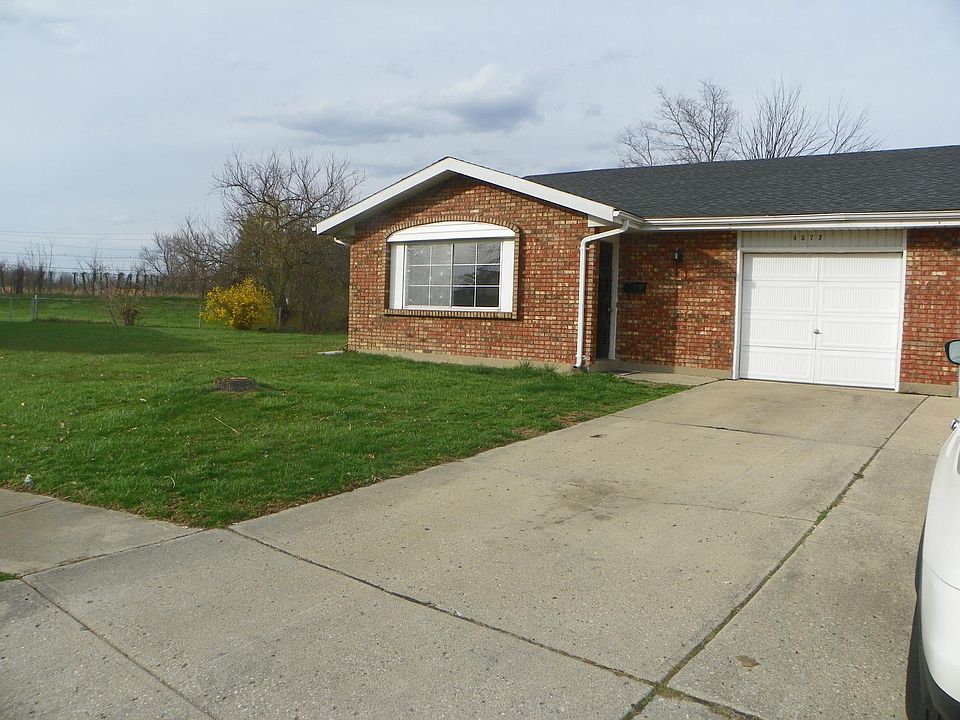 Front of house view. One car garage with two car parking driveway