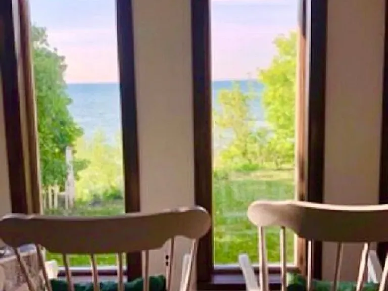 Seven windows overlook the Lake