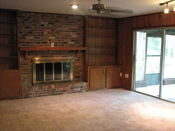 Lower level Family room with brick fireplace
