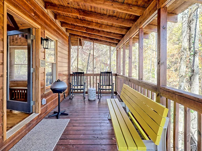 Rocking chairs and small charcoal grill on the balcony