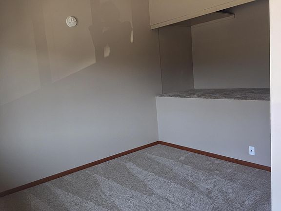 Large den off living room with built in nook (or closet/sitt