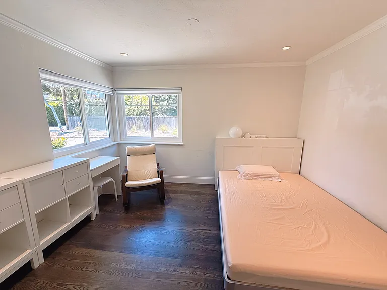 Guest bedroom on opposite side of other bedrooms with en-suite bathroom