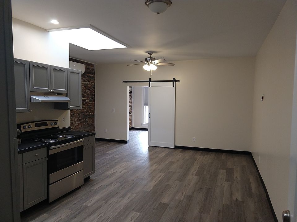 View upon entering the unit. The bedroom door is directly ahead.