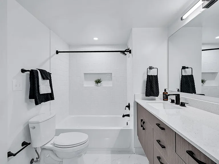 Spa inspired bathrooms with tiled shower and custom vanity