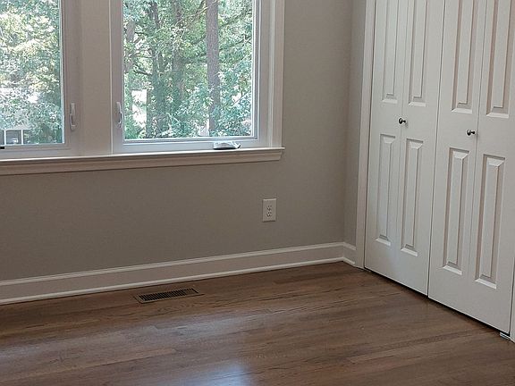 Large second bedroom overlooks private yard