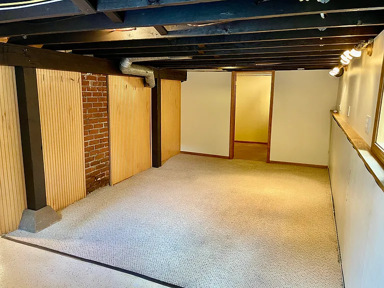 Large den/office space in basement.