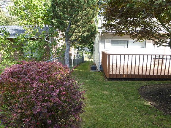 Large deck on front of home.