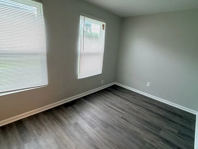 Bright and inviting living room/den with ample natural light.