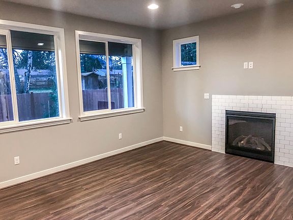 Great Room Note: All photos are taken in Unit B. However, unit A is identical in both floorplan and finishes, just a mirror image.