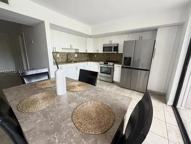 8700 SW 133rd Avenue Rd #302 — Photo 7