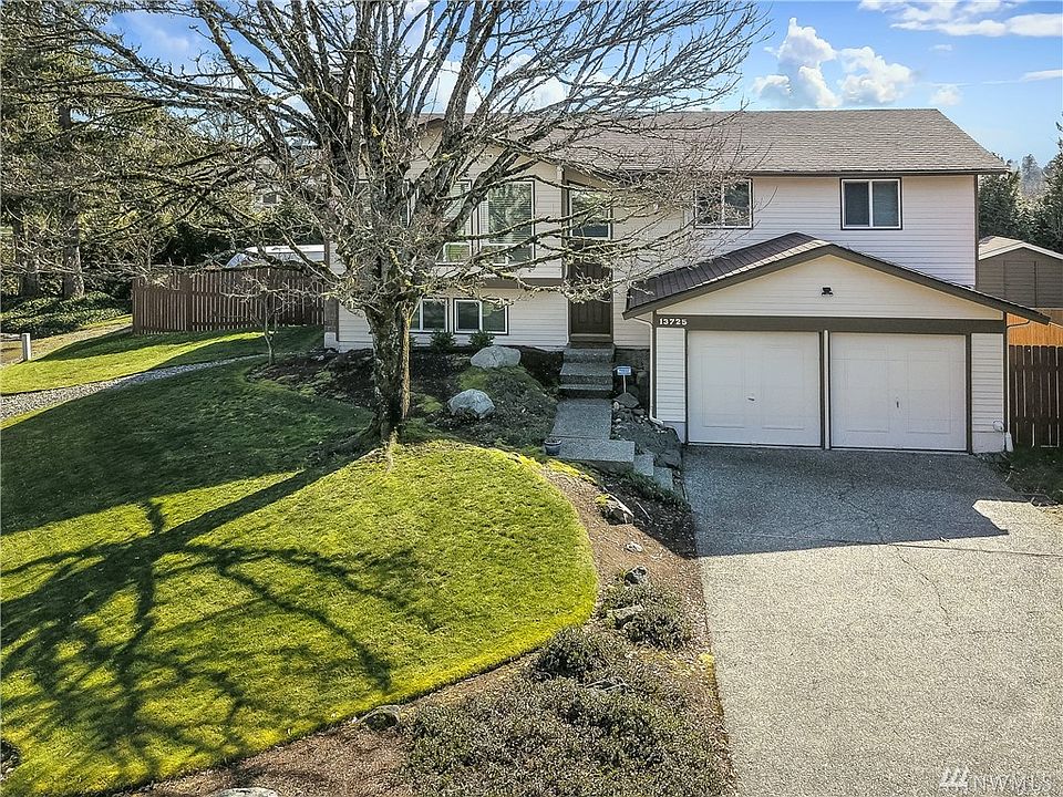 Front View of Home, great corner lot with RV parking in the back. 
