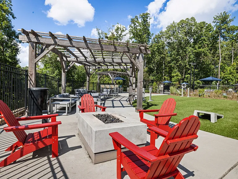 Outdoor Social Space with Fire Feature, Lounge Seating, and Shaded Pergolas