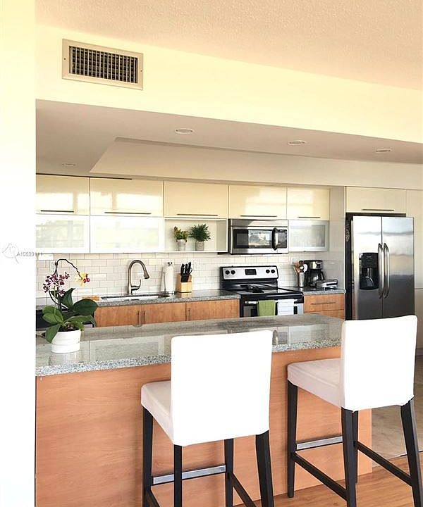 1st image of 11930 N Bayshore Dr APT 408