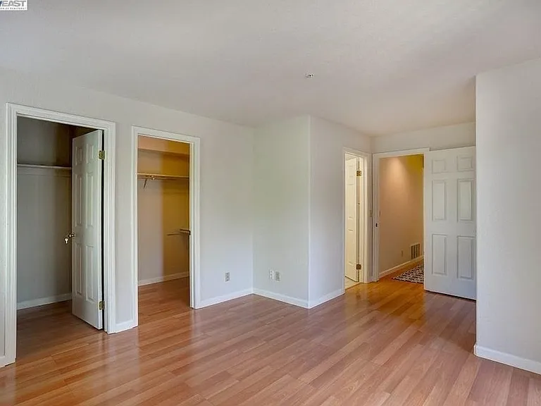 Master bedroom empty (Photo taken before our recent flooring upgrade)