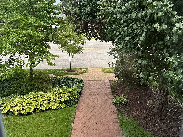 View out front building window from landing heading to 2E