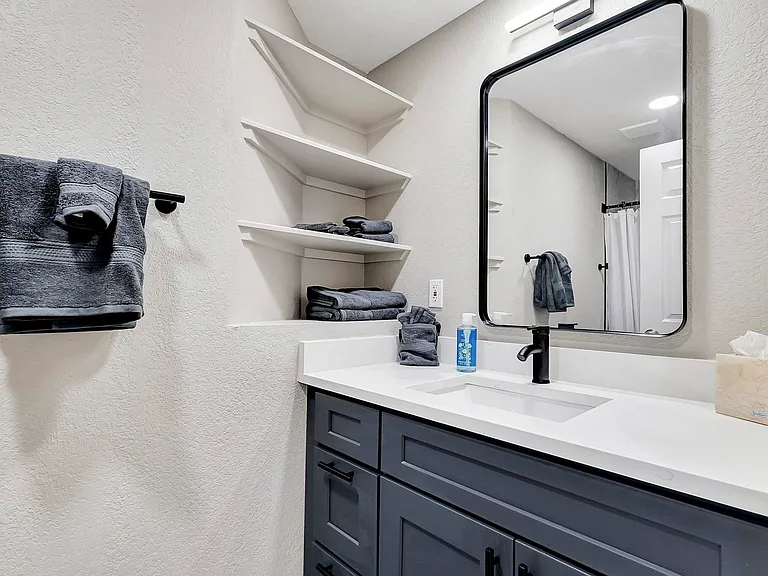 Hall bathroom with shower.
