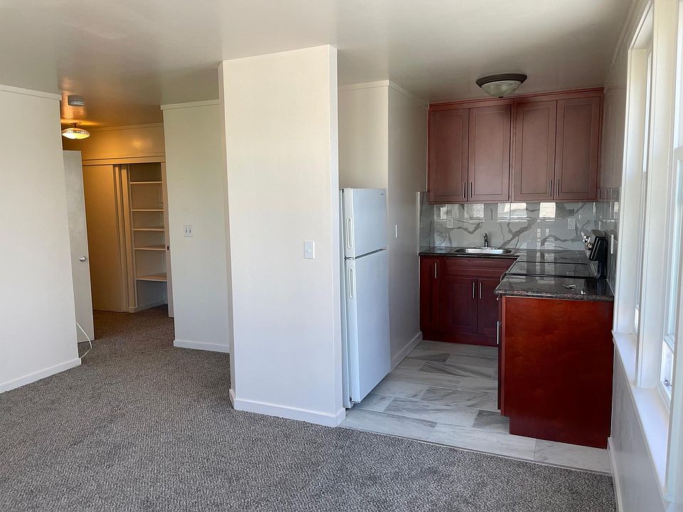 Newly remodeled kitchen and new carpet in the living room