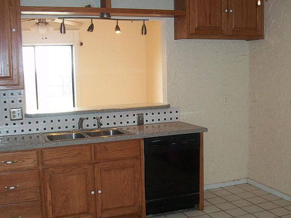 KITCHEN-OPEN TO LIVING ROOM